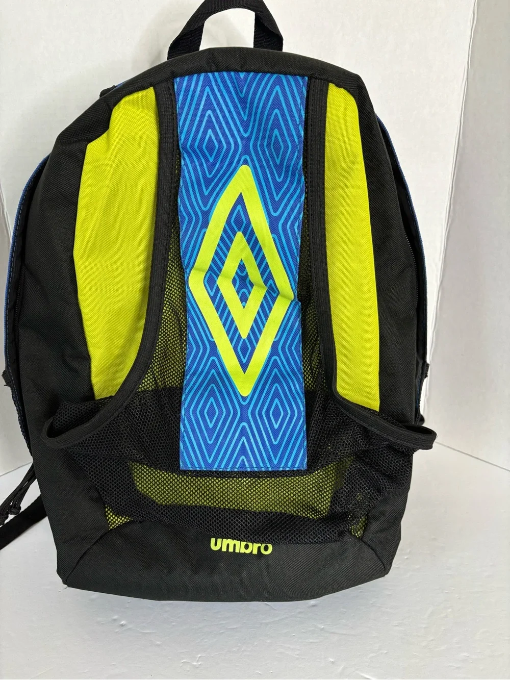 The Umbro soccer backpack features a distinctive blue diamond pattern
